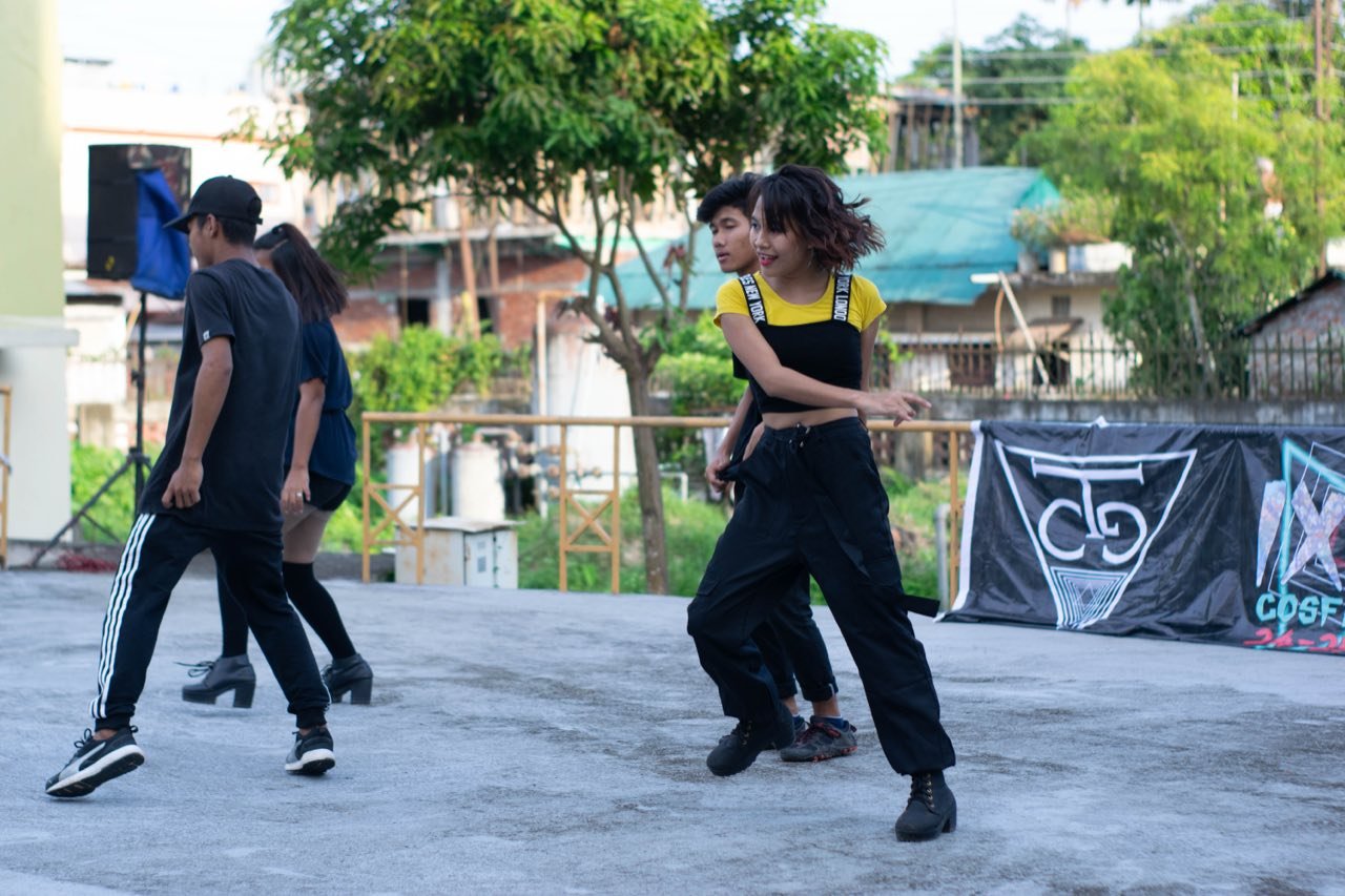 Dancers performing on the open floor at CosFest IXA 2019